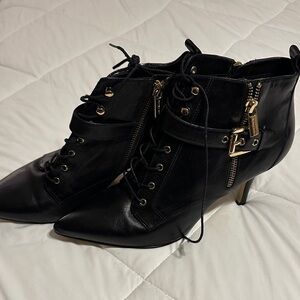MICHAEL Michael Kors Black Heeled Boots with Gold Accents